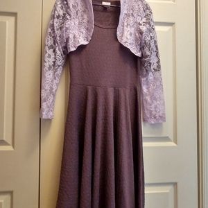 Lularoe Nicole small. Solid purple jacquard.